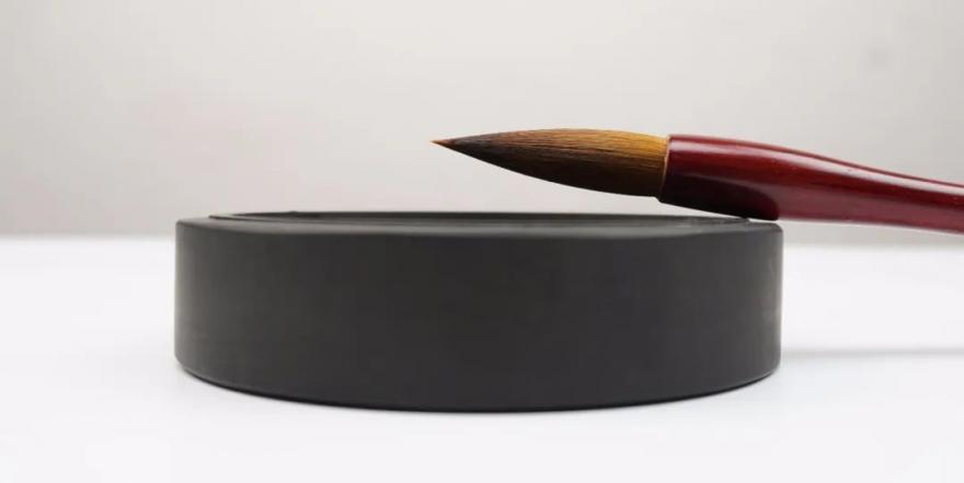 毛笔是谁什么时候发明的